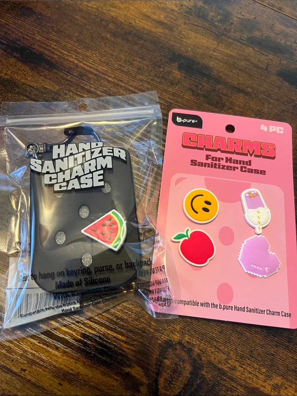 Black Hand Sanitizer Charm Case with Pink and Red Charms